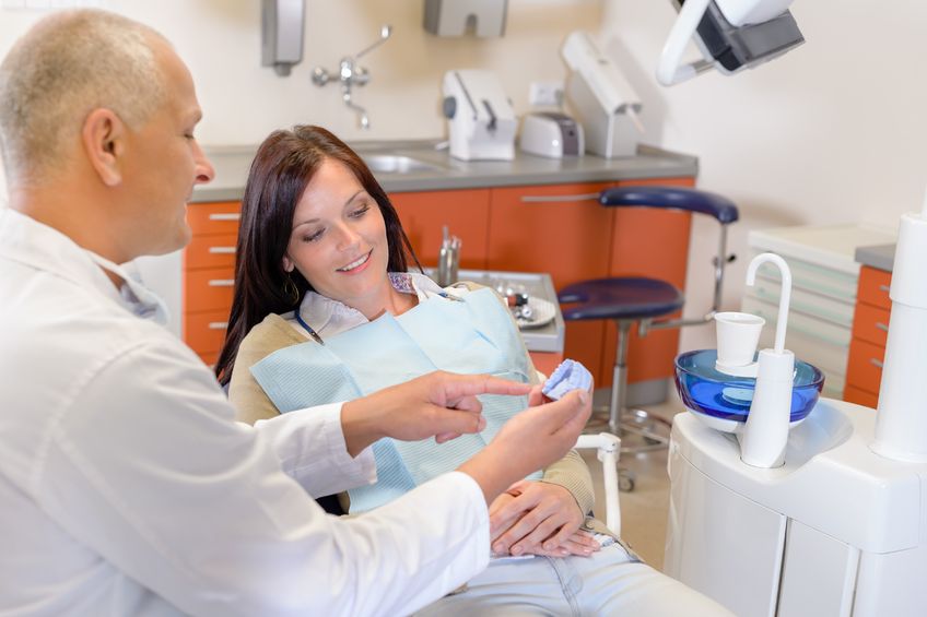 Lady sitting in a chair during orthodontic consultation
