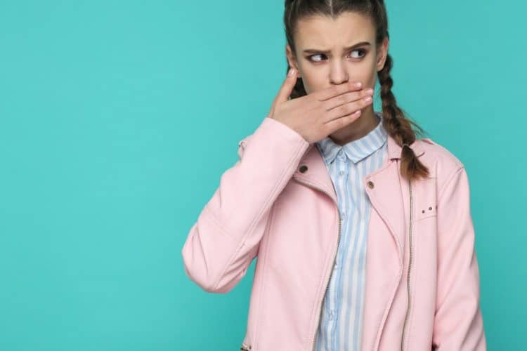 Girl with braces with bad breath